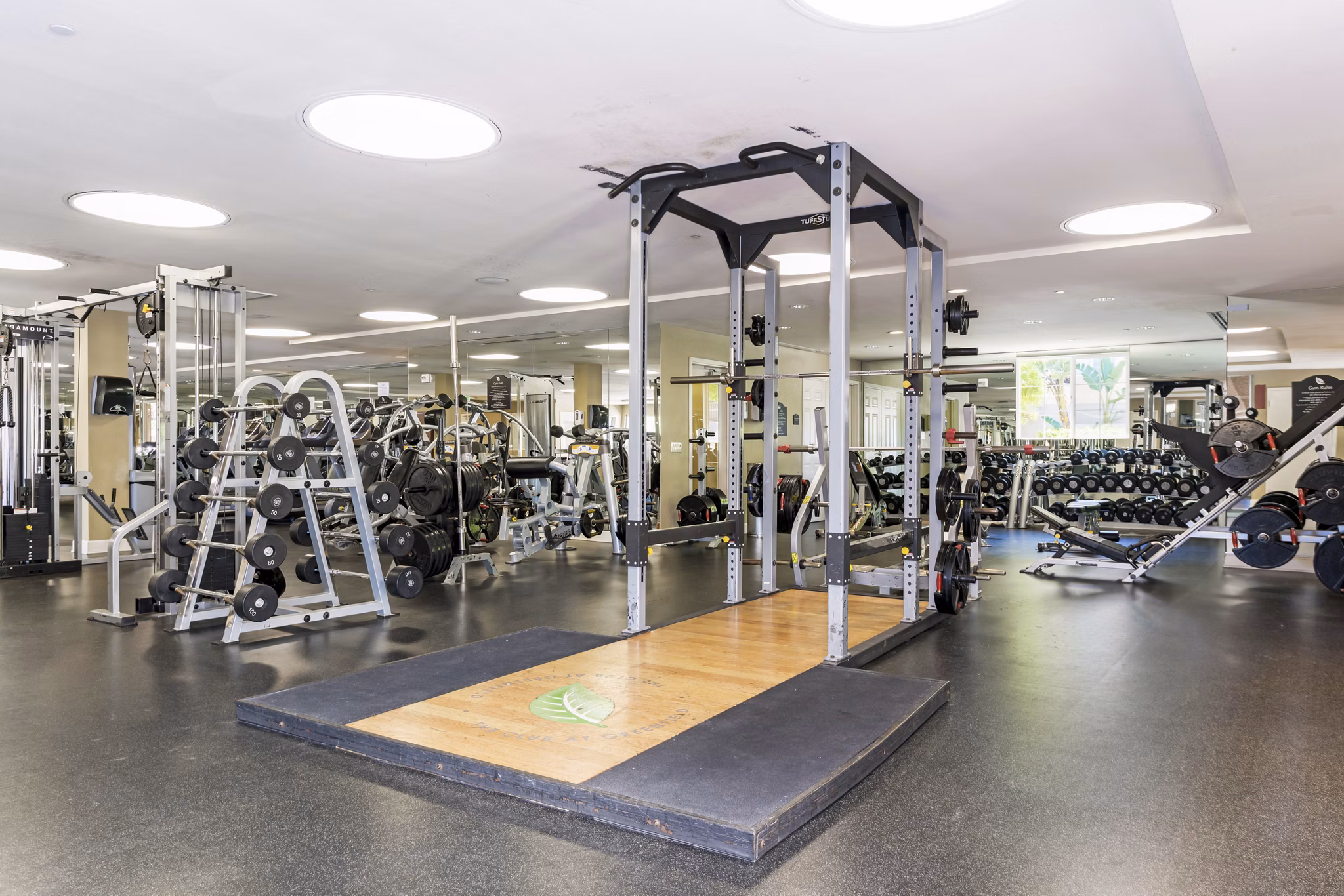 State-of-the-art fitness center featuring modern equipment at Greenfield Village Apartments