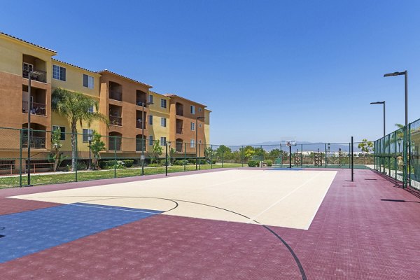 Sport court offering basketball and tennis at Greenfield Village Apartments, a luxury community by Greystar