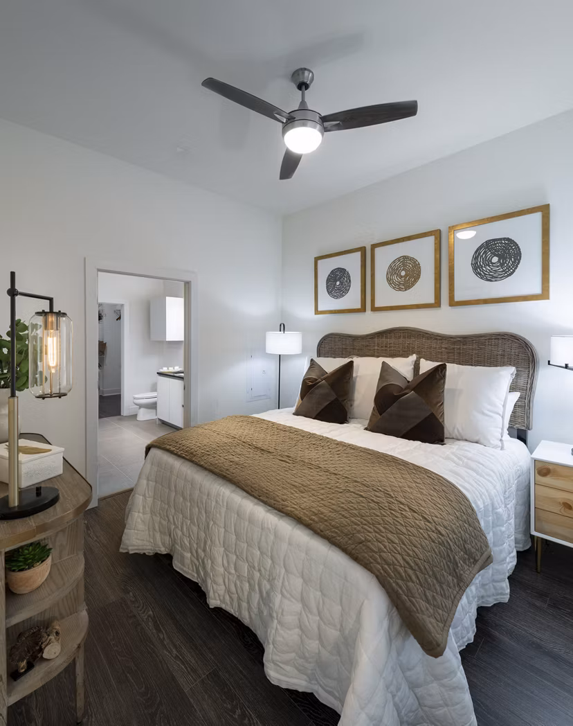 Modern bedroom with elegant furnishings at Hanover West LA Apartments