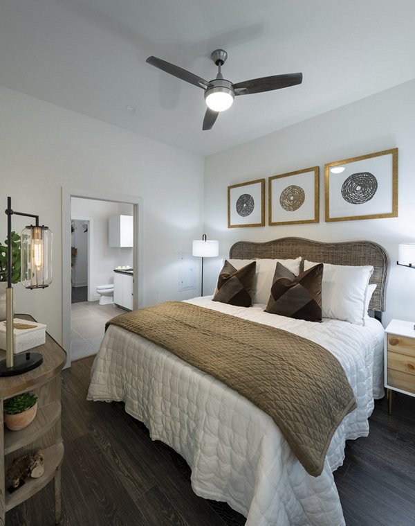 Modern bedroom with elegant furnishings at Hanover West LA Apartments
