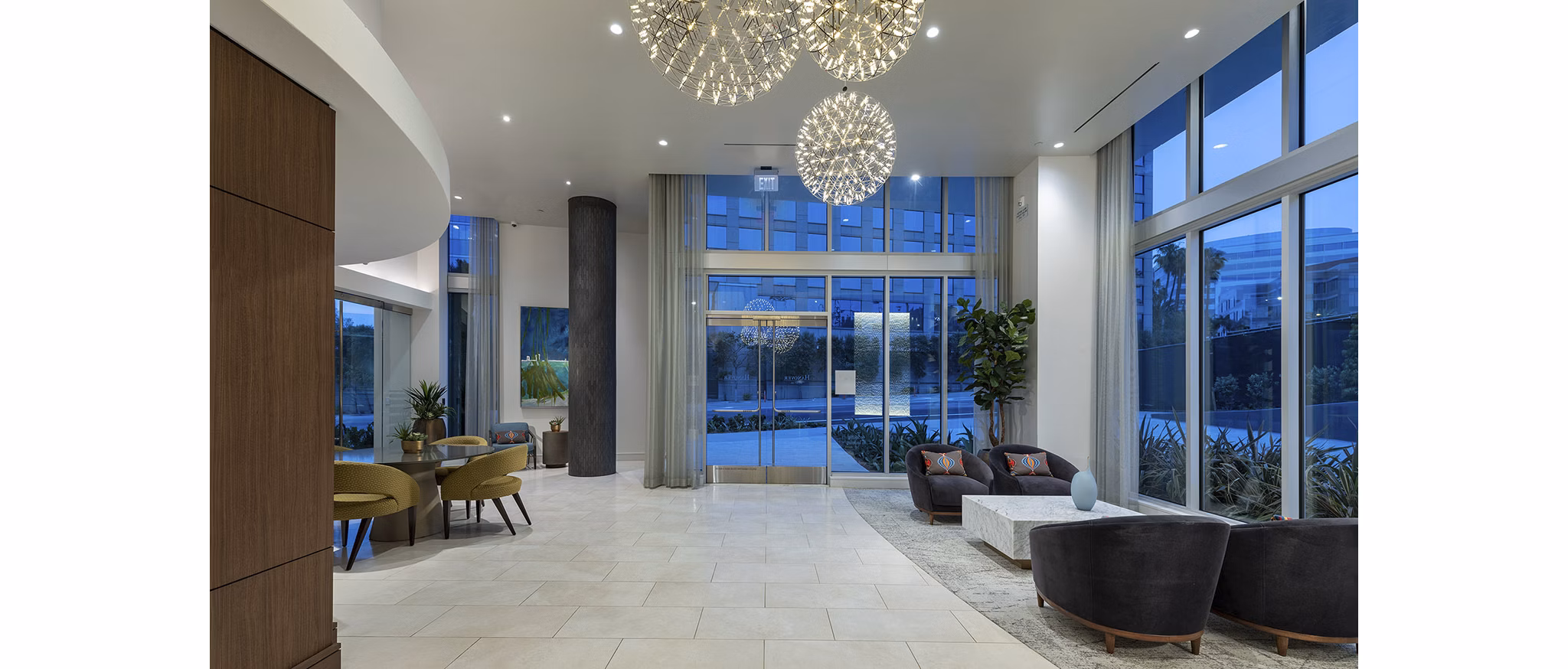 Clubhouse with modern decor and lounge area at Hanover West LA Apartments