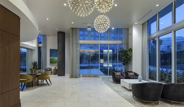 Clubhouse with modern decor and lounge area at Hanover West LA Apartments