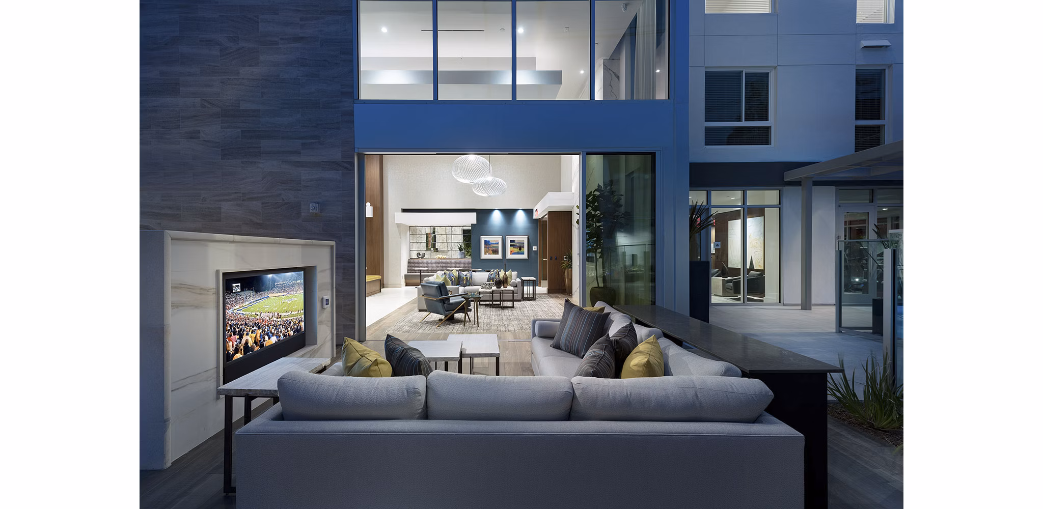 Clubhouse with modern design elements at Hanover West LA Apartments, offering community gathering spaces and luxury amenities