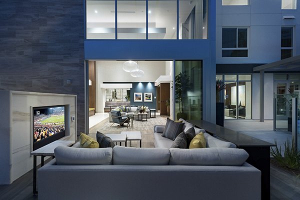Clubhouse with modern design elements at Hanover West LA Apartments, offering community gathering spaces and luxury amenities