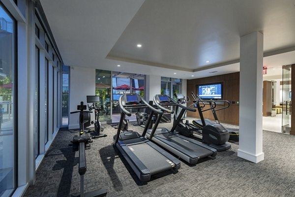 Fitness center with modern equipment at Hanover West LA Apartments