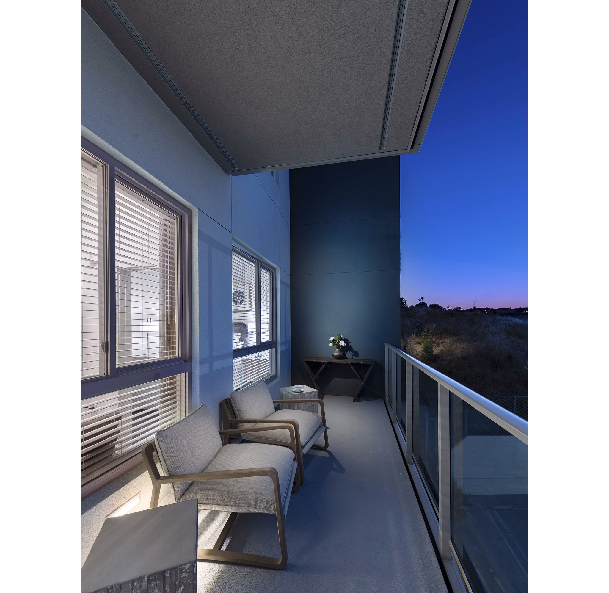 Private patio with modern furnishings at Hanover West LA Apartments, a luxury living space in Los Angeles offering stylish outdoor relaxation