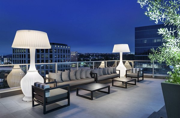 Serene courtyard with lush greenery at Hanover West LA Apartments, luxury living in Los Angeles
