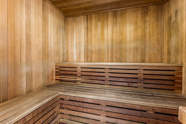 Sauna with wood interiors at The Landing at Ocean View Hills Apartments, offering relaxation and wellness for residents