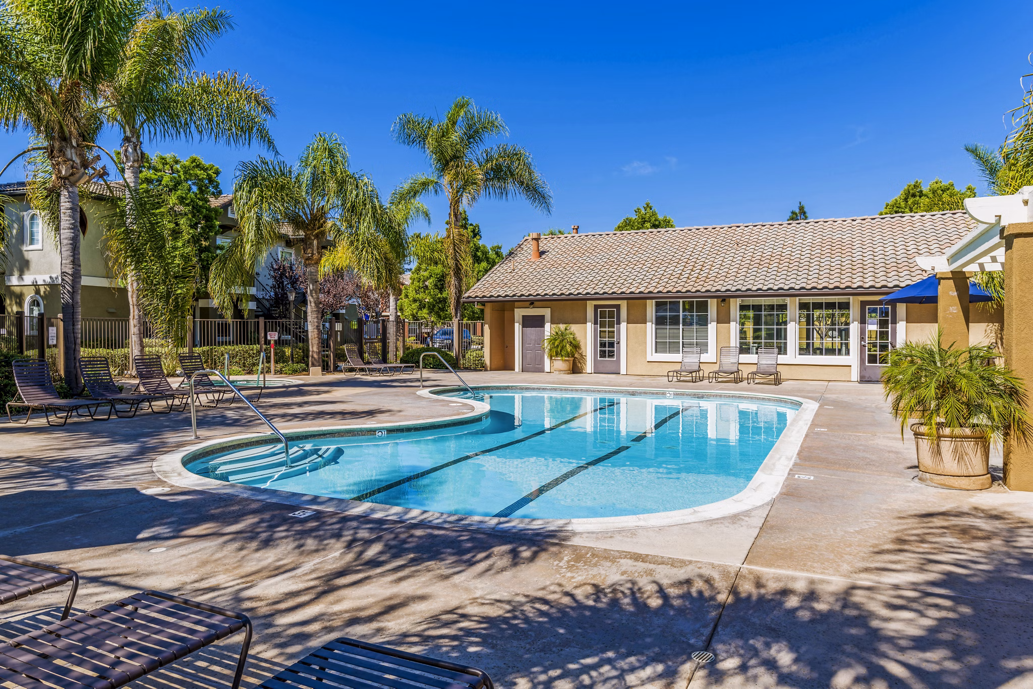 Inviting outdoor pool area at The Landing at Ocean View Hills Apartments, perfect for relaxation and leisure in luxury surroundings