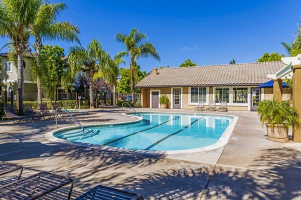 Inviting outdoor pool area at The Landing at Ocean View Hills Apartments, perfect for relaxation and leisure in luxury surroundings