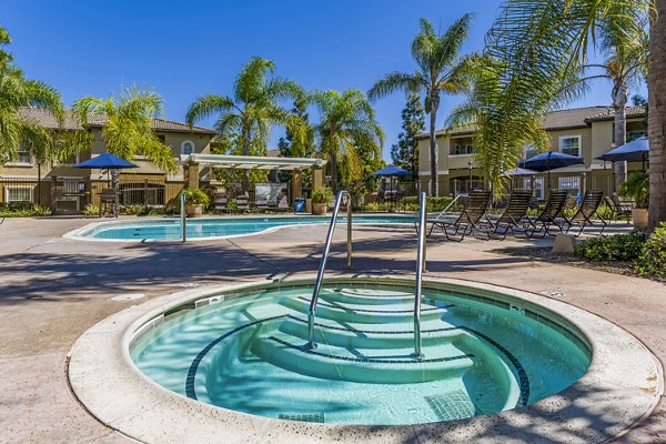 The Landing at Ocean View Hills: Luxurious pool and hot tub area in Oceanside residence