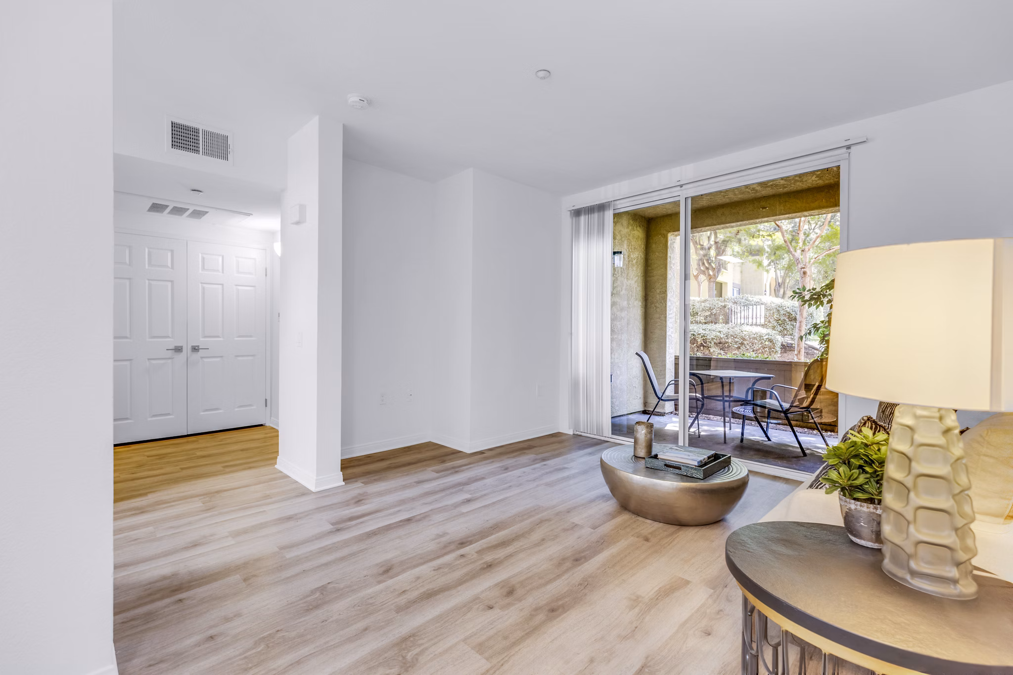 Cozy living room with modern design elements in Legacy Apartments