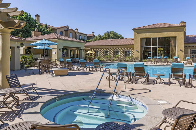 Relaxing outdoor hot tub at Legacy Apartments, luxury community living