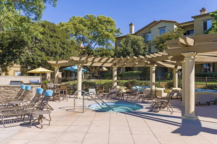 Relaxing hot tub at Legacy Apartments offering luxurious amenities for residents