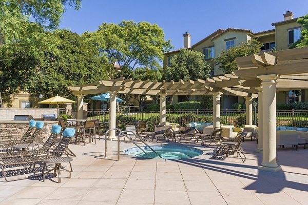 Relaxing hot tub at Legacy Apartments offering luxurious amenities for residents