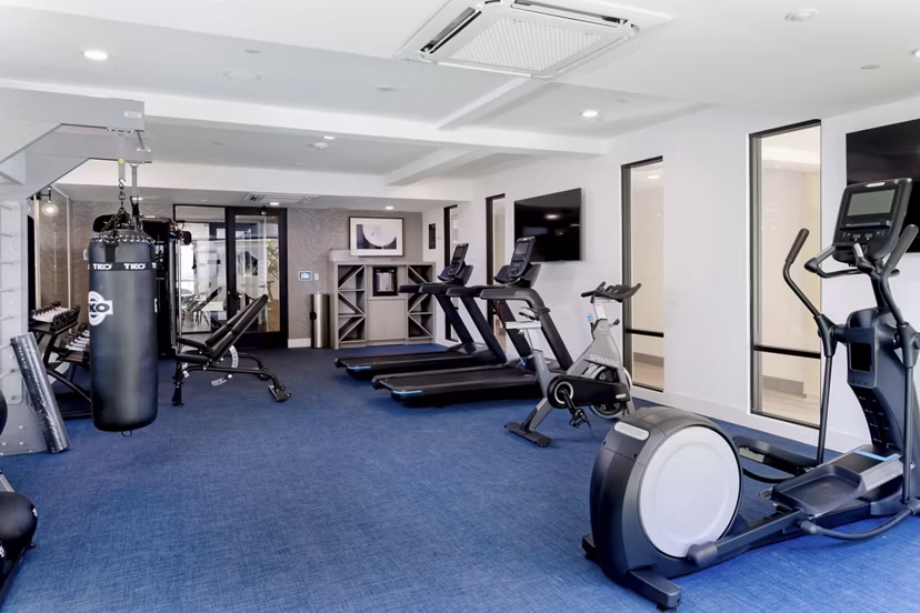 Fitness center with state-of-the-art equipment at The Lofts at Carlsbad Village Apartments