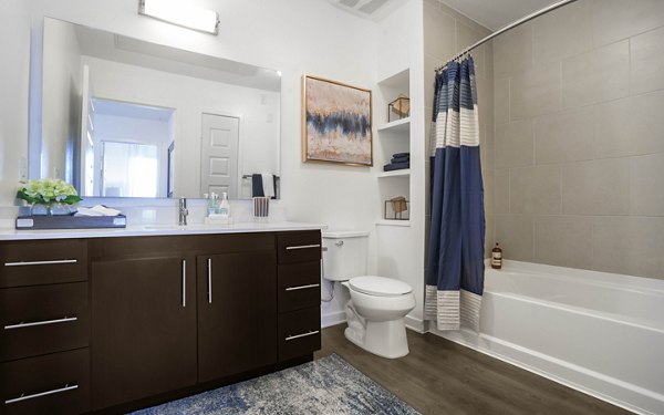 Bathroom with stylish fixtures and modern design at Metro Mission Valley Apartments, offering luxury living in a serene San Diego location