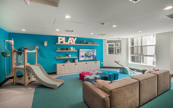 Game room featuring billiards and lounge seating at Metro Mission Valley Apartments