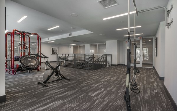 Fitness center with modern equipment at Metro Mission Valley Apartments, offering residents premium workout facilities for a healthy lifestyle