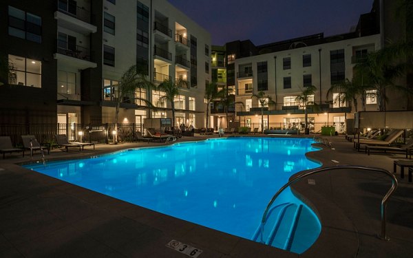 Tranquil poolside with lounge chairs at Metro Mission Valley Apartments