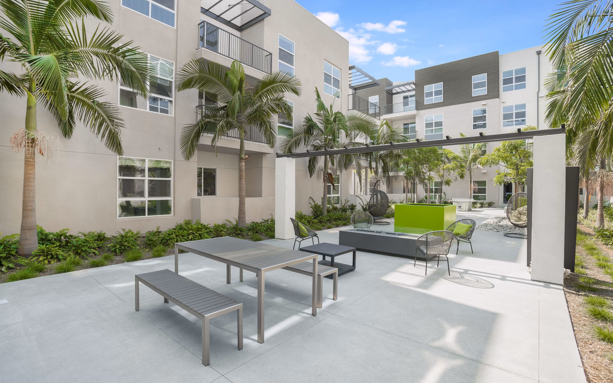 Cozy fire pit surrounded by seating at Metro Mission Valley luxury apartments