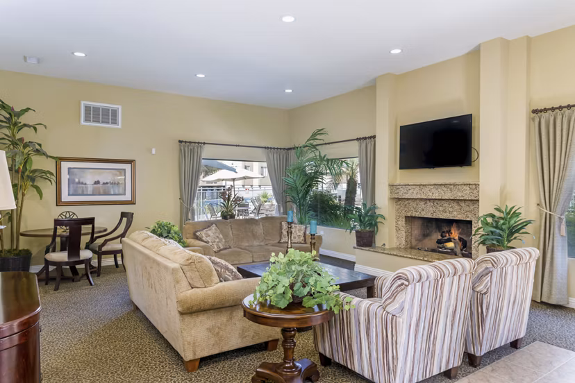 Modern clubhouse with cozy seating areas at Navajo Bluffs Apartments, perfect for social gatherings and community events