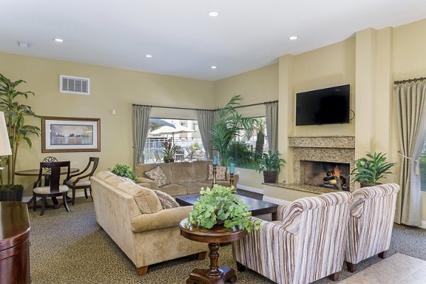 Modern clubhouse with cozy seating areas at Navajo Bluffs Apartments, perfect for social gatherings and community events