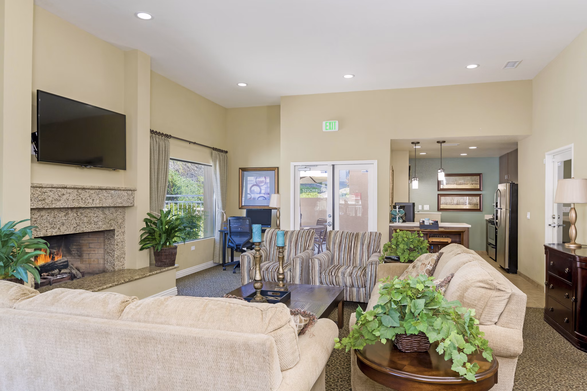 Clubhouse featuring modern design and seating at Navajo Bluffs Apartments