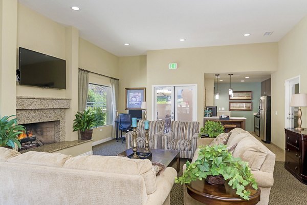 Clubhouse featuring modern design and seating at Navajo Bluffs Apartments