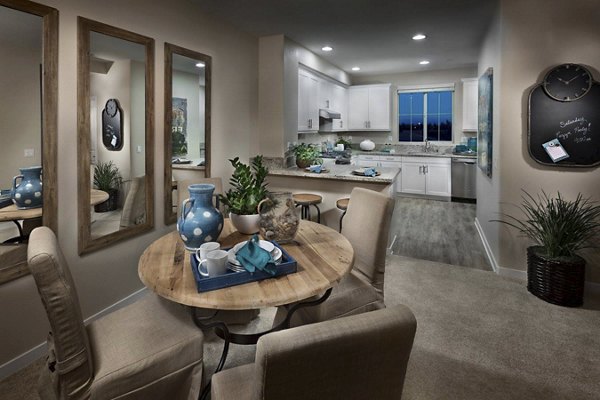 Dining area featuring modern decor and hardwood floors in Ocean Air Apartments