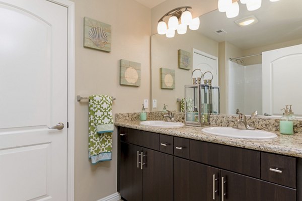 Elegant bathroom with modern fixtures at Riveredge Terrace Apartments
