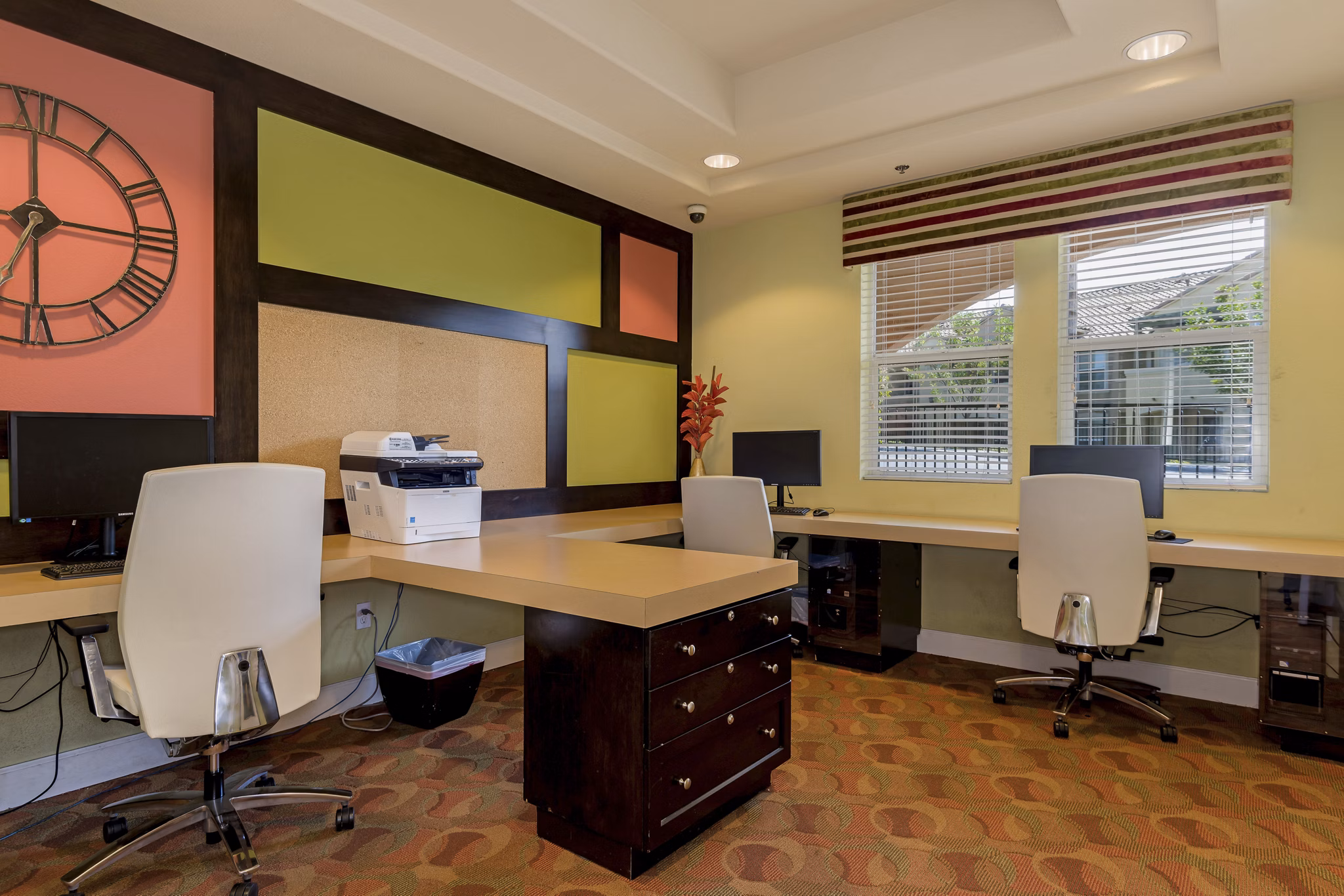 Modern business center with collaborative workspaces at Riveredge Terrace Apartments