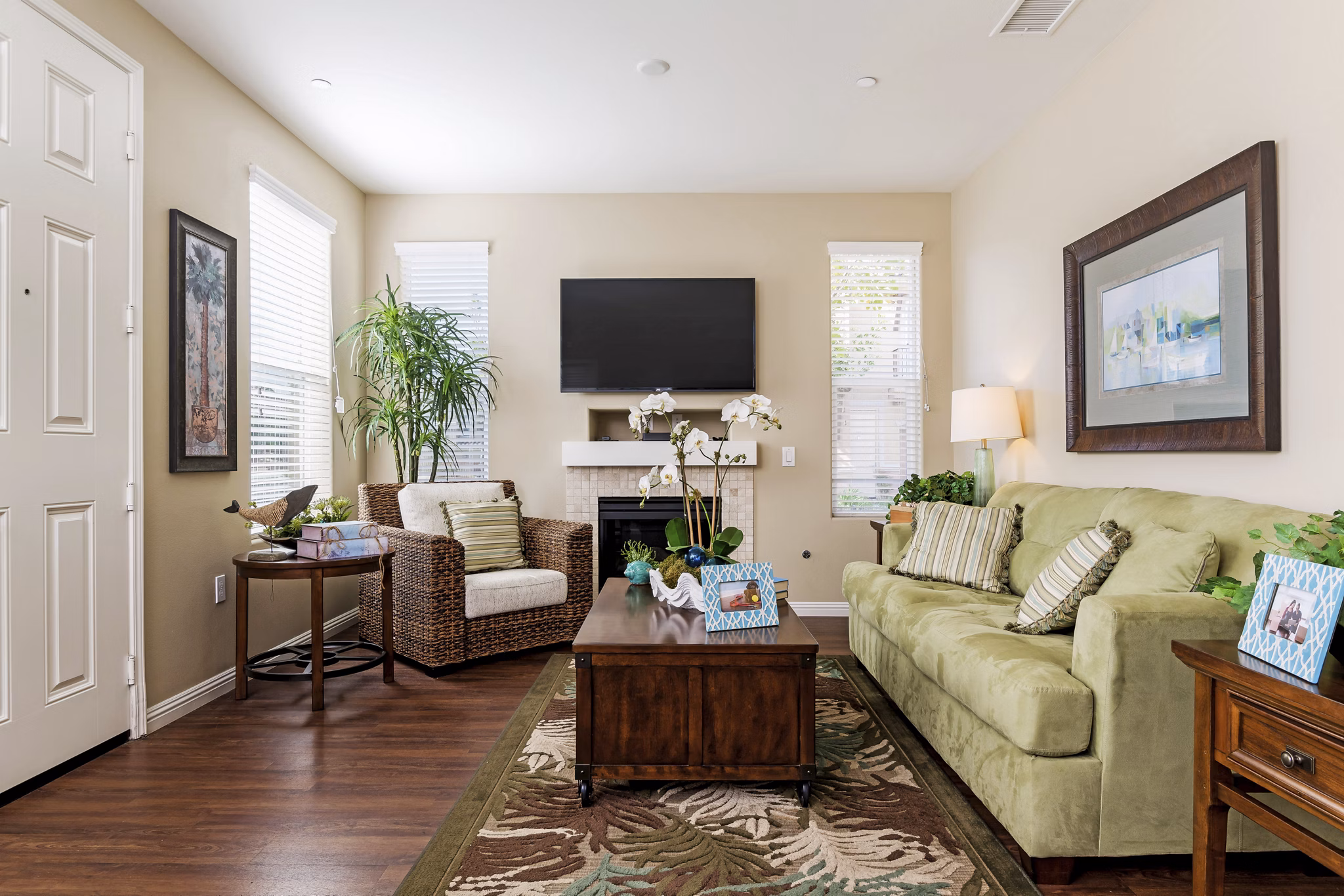Open living room with modern decor and ample natural light at Riveredge Terrace Apartments, a luxury Greystar community