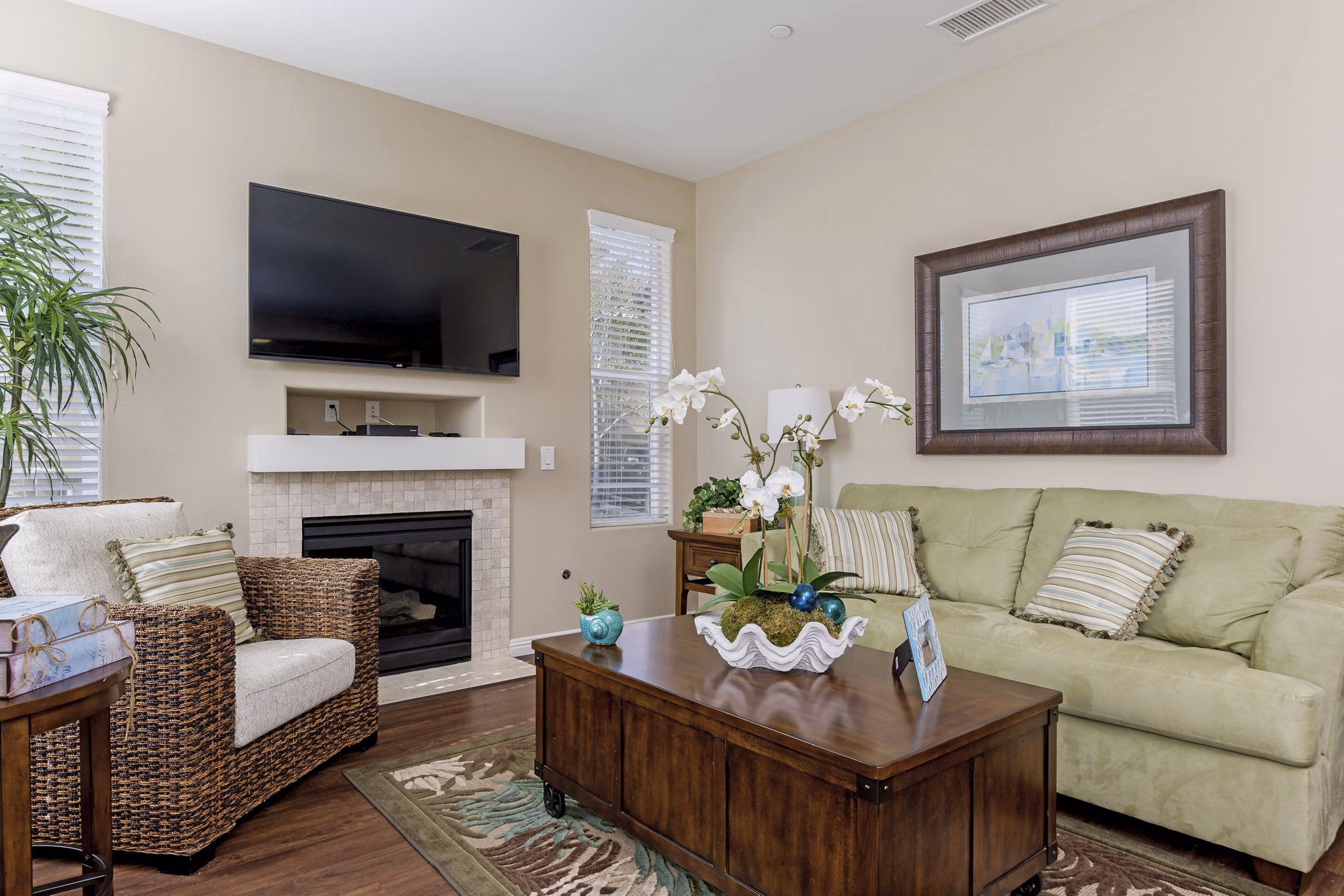 Spacious living room with modern decor at Riveredge Terrace Apartments