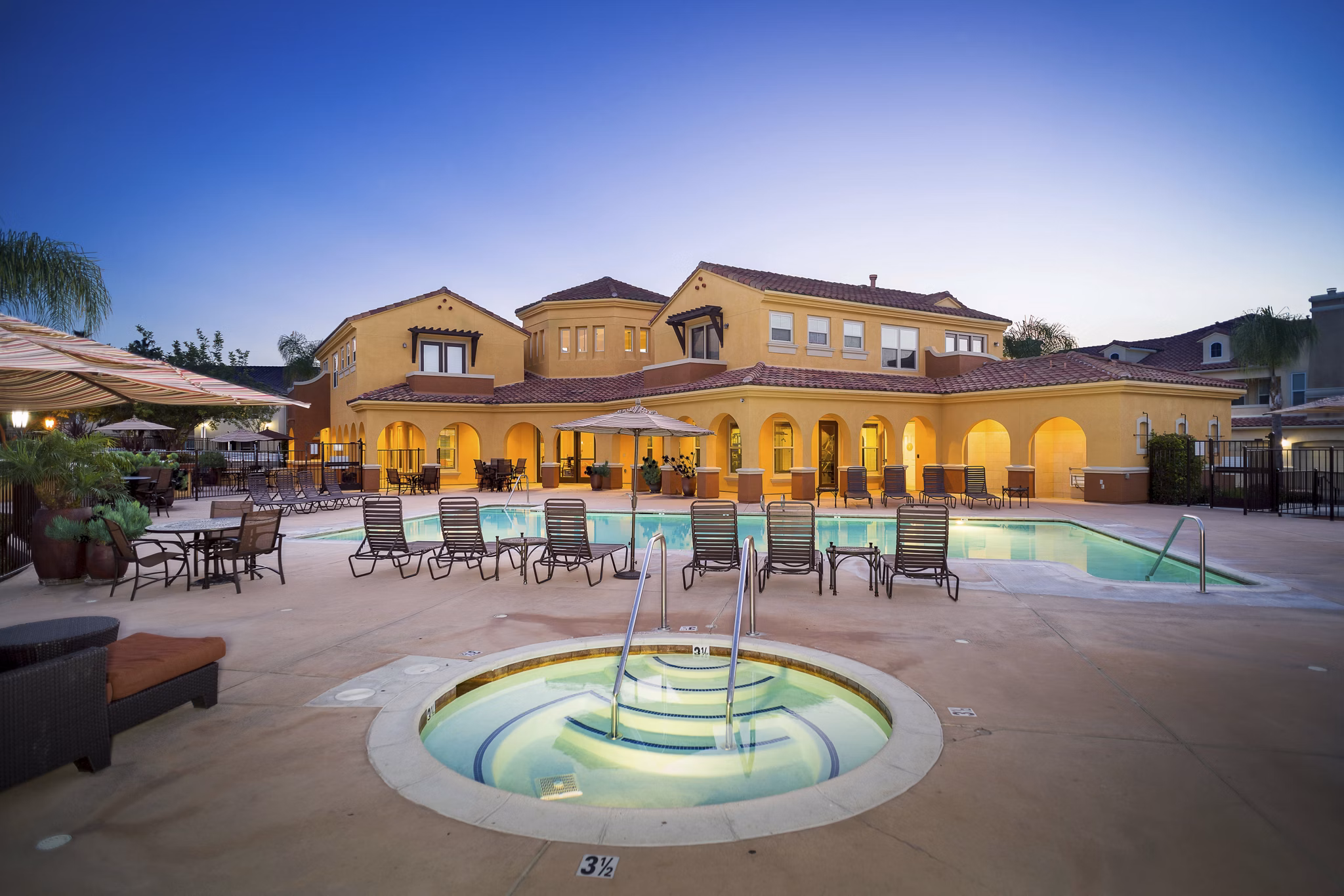 Relaxing hot tub at Riveredge Terrace Apartments, offering luxury amenities for a serene lifestyle