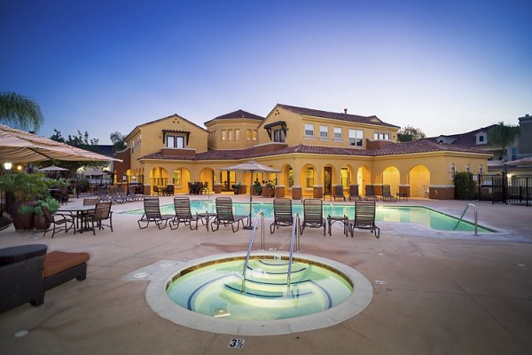 Relaxing hot tub at Riveredge Terrace Apartments, offering luxury amenities for a serene lifestyle