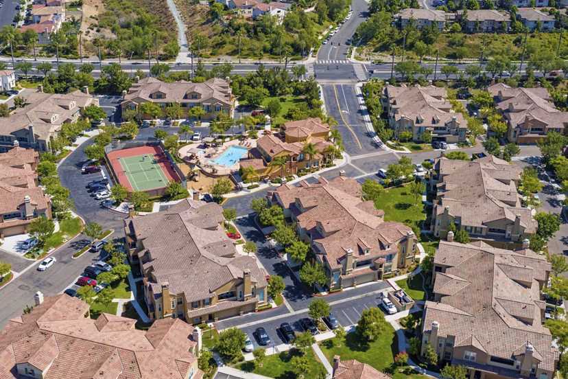 Riveredge Terrace: Scenic view of luxury apartments near water in urban setting