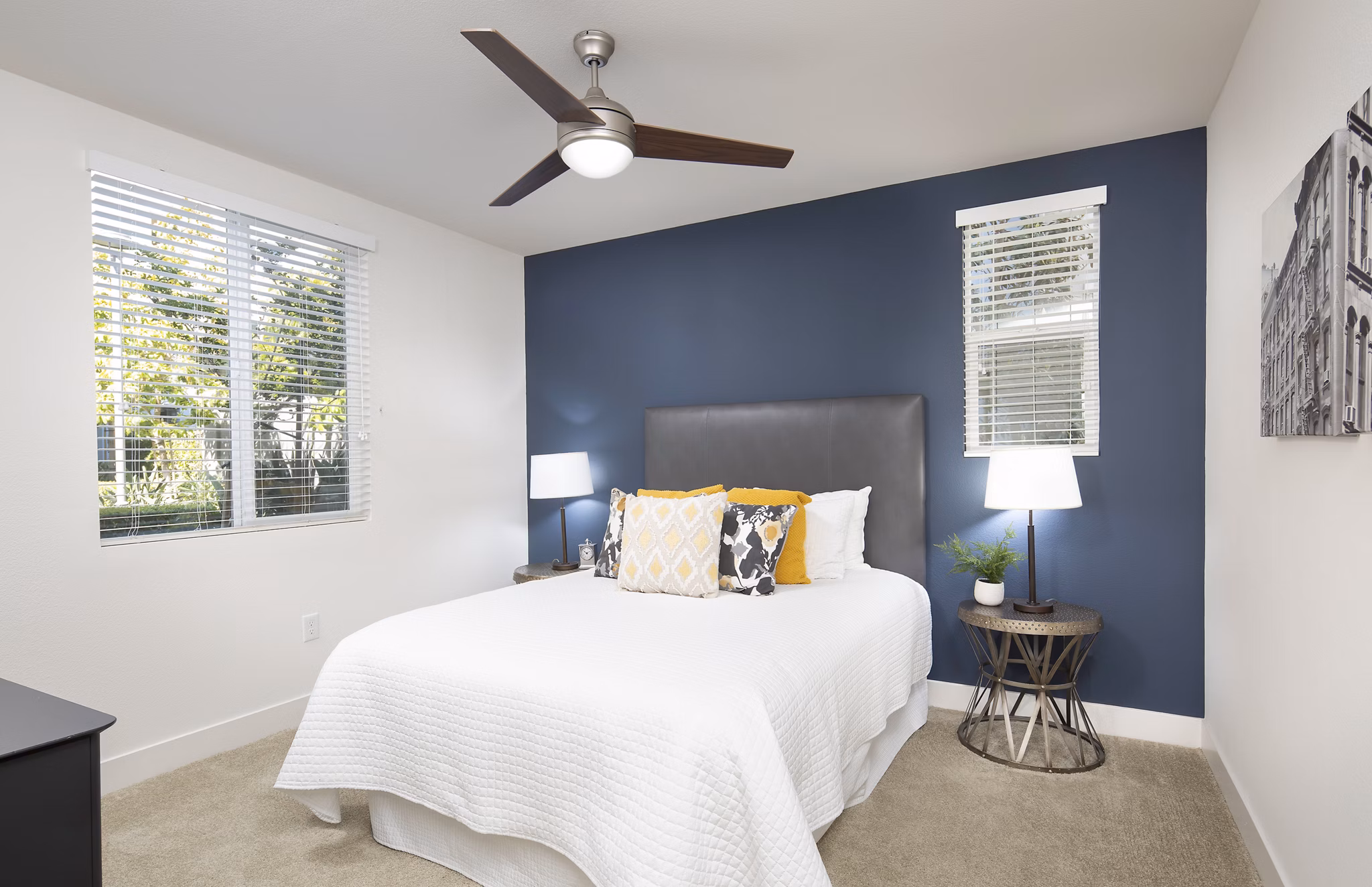 Cozy bedroom with modern furnishings at Palomar Station Apartments