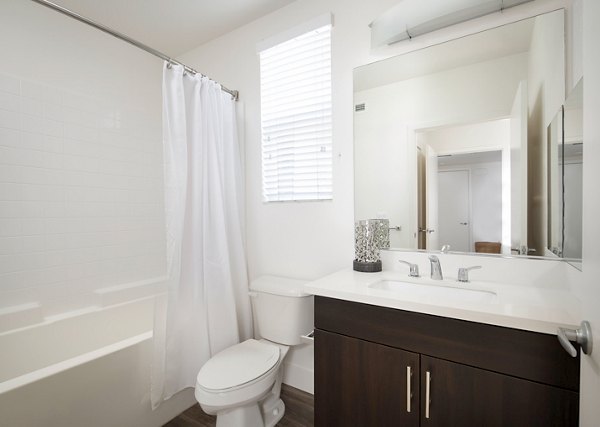 Modern bathroom with sleek fixtures at Palomar Station Apartments, luxury living in vibrant San Marcos