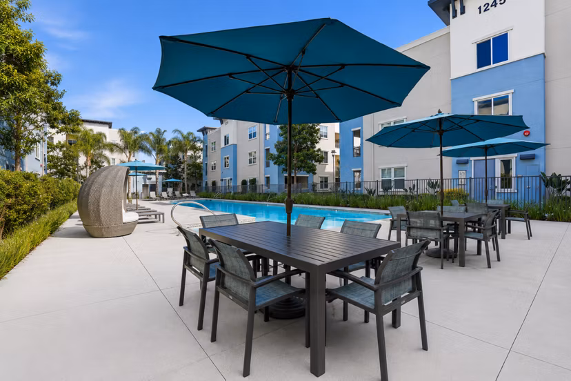 Inviting patio with modern seating at Palomar Station Apartments, ideal for luxury outdoor relaxation and gatherings