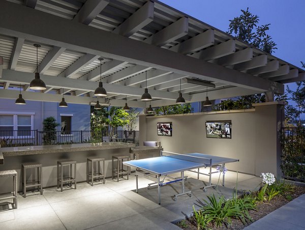 Inviting patio with modern seating at Palomar Station Apartments, ideal for luxury outdoor relaxation and gatherings