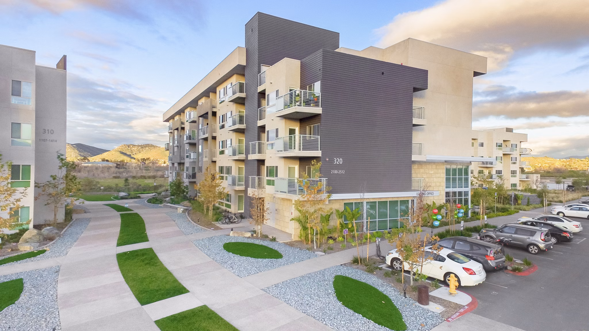 Parc One Apartments: Luxurious view of modern high-rise luxury apartments in Greystar's bustling urban community