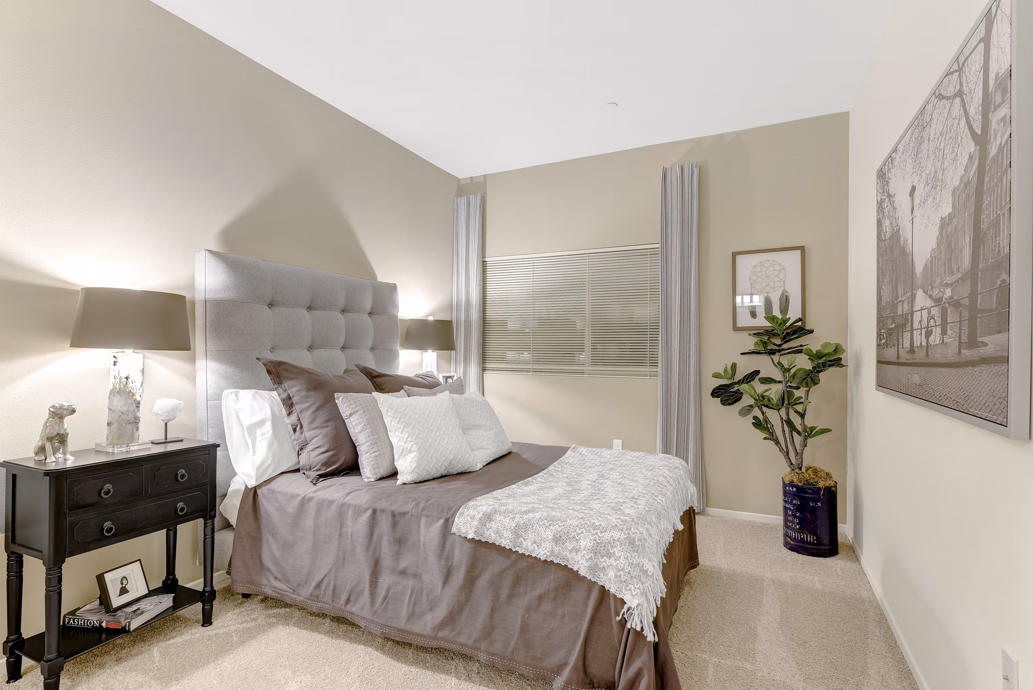 Bedroom featuring modern design and plush bedding in Parc One Apartments