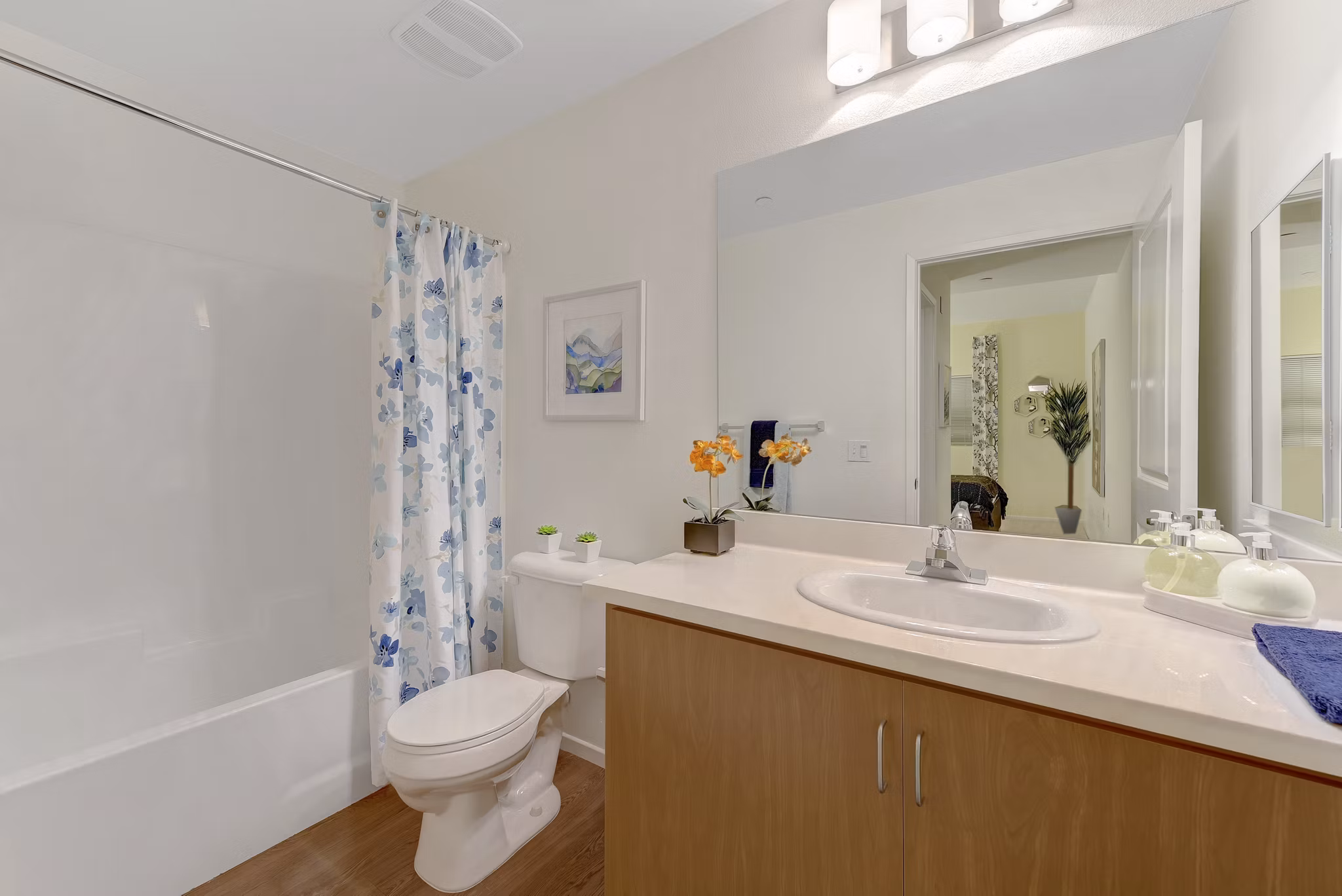 Modern bathroom with sleek fixtures and spacious vanity at Parc One Apartments