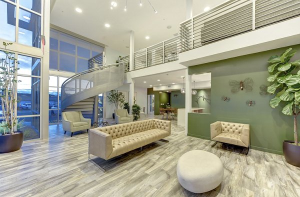 Modern clubhouse with stylish seating and ambient lighting at Parc One Apartments