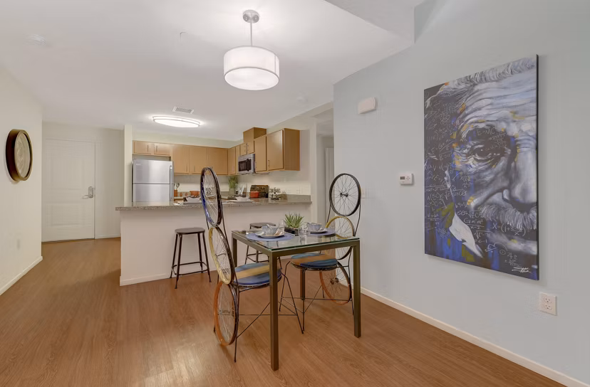Dining area with modern dÃ©cor at Parc One Apartments, featuring stylish furnishings and contemporary lighting for an inviting atmosphere