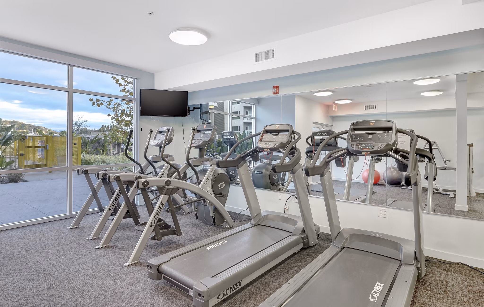 Modern fitness center with state-of-the-art equipment at Parc One Apartments