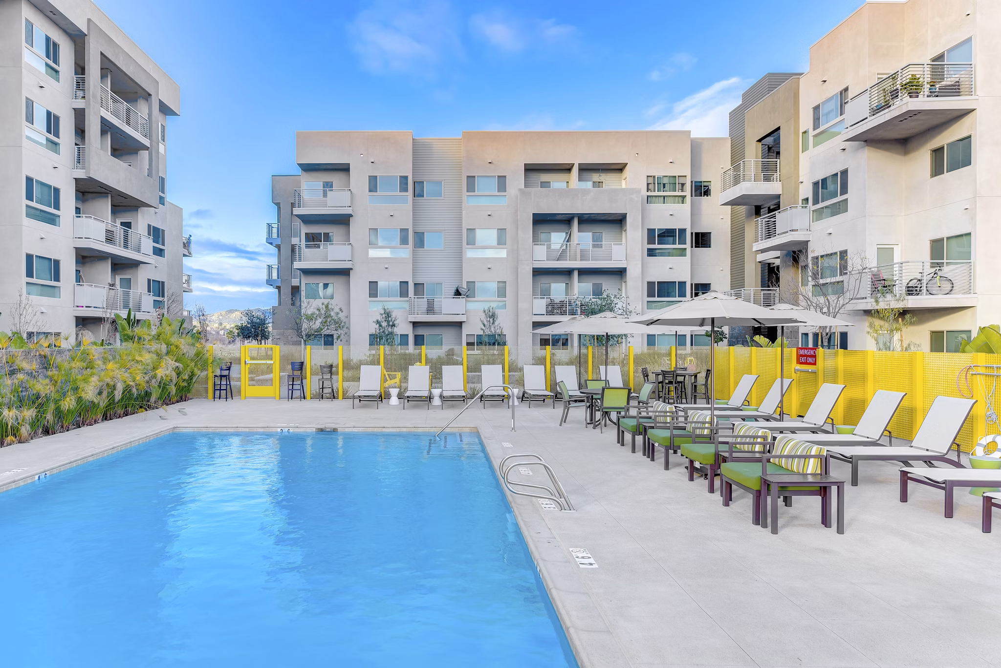 Modern outdoor pool at Parc One Apartments offering luxury relaxation spaces
