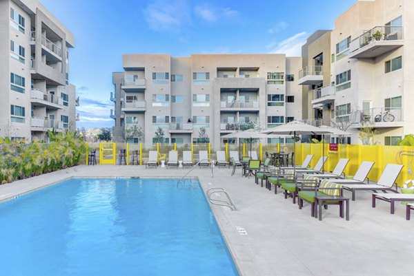 Modern outdoor pool at Parc One Apartments offering luxury relaxation spaces