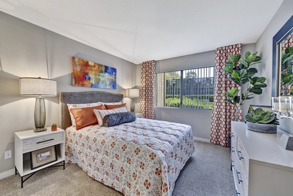 Elegant bedroom with designer furnishings in Park Pointe Apartments, offering luxury living in a desirable location